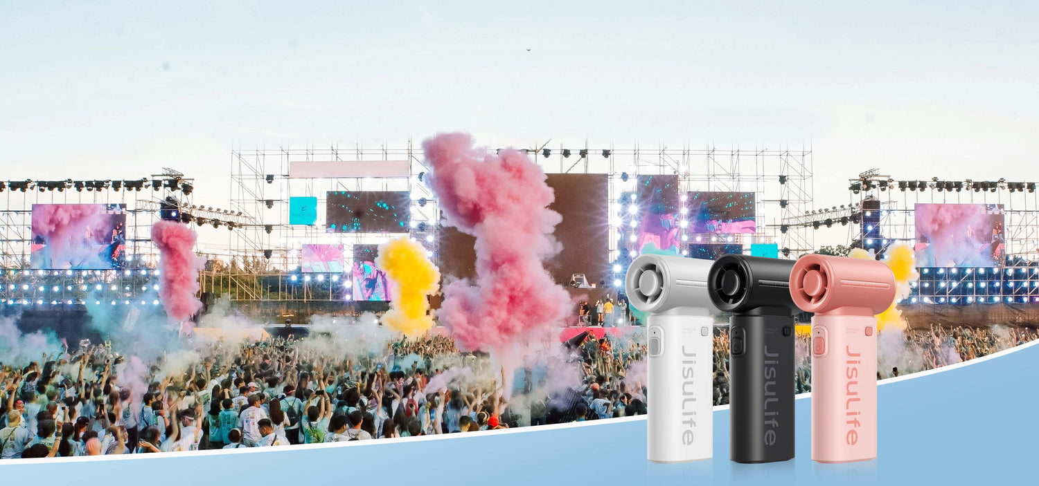 JisuLife Portable Fans in white, black and pink at colorful Music Festivals with vibrant crowd and stage lights.